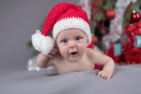Baby in christmas hatの写真素材