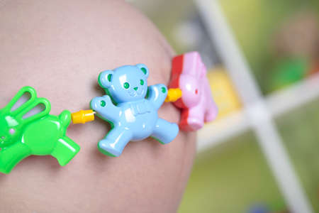 Pregnant woman with a toyの写真素材