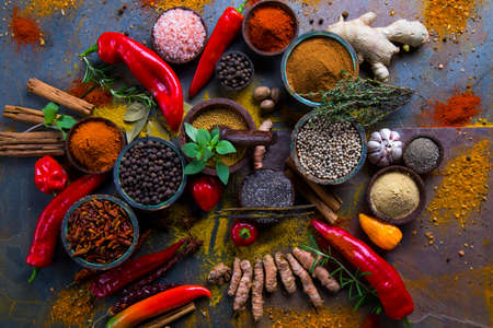 Spices on wooden bowl backgroundの写真素材