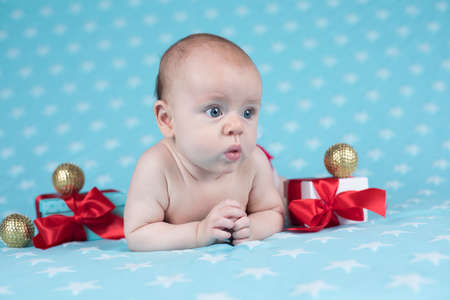Christmas baby crawlingの写真素材