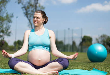 Pregnant woman yogaの写真素材