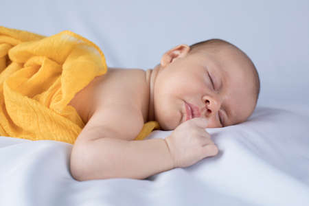 Beautiful newborn baby sleepingの写真素材