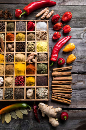 Spices in wooden box, Cooking ingredientの写真素材