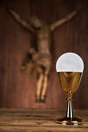 Eucharist symbol of bread and wine, chalice and host, First communion backgroundの写真素材