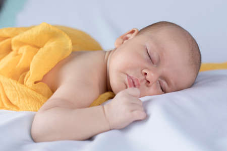 Adorable baby sleepingの写真素材