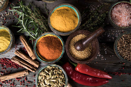 Spices on wooden bowl backgroundの写真素材