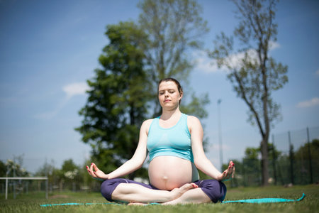 Pregnant woman yogaの写真素材