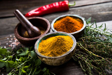 Spices over wooden backgroundの写真素材