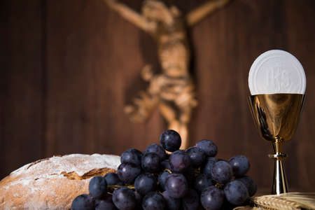 Eucharist symbol of bread and wine, chalice and host, First communion backgroundの写真素材