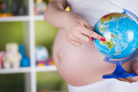 Globe, Pregnancy conceptの写真素材