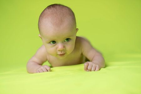 Crawling baby boyの写真素材