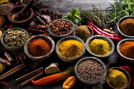 Spices over wooden backgroundの写真素材
