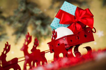 Christmas, Santa sleigh on gift box backgroundの写真素材