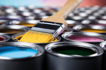 Group of tin metal cans with color paint