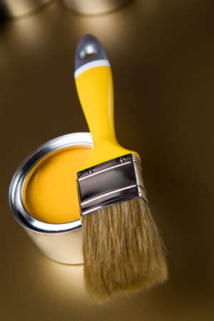 Tin cans with paint, brushes and bright palette of colorsの写真素材