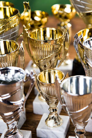 Award winning and championship concept, trophy cup on sport backgroundの写真素材