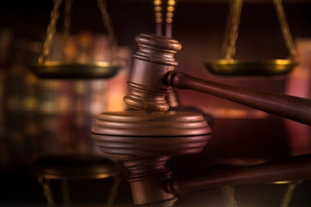 Law theme, mallet of the judge, mirror reflection backgroundの写真素材