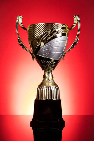 Award winning and championship concept, trophy cup on sport backgroundの写真素材