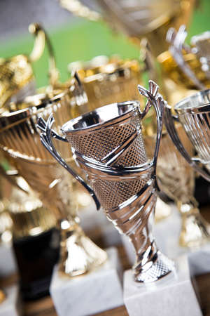 Award winning and championship concept, trophy cup on sport backgroundの写真素材