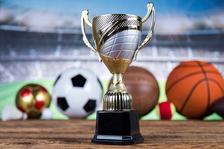 Achievement trophy, winning sport background