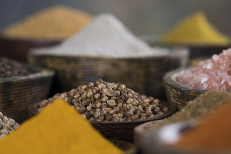 Cookbook and various spices backgroundの写真素材