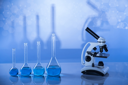 Laboratory beakers,Science experiment, blue backgroundの写真素材