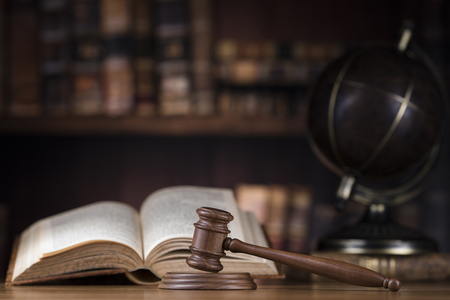 Wooden gavel and books, Law, globe conceptの写真素材