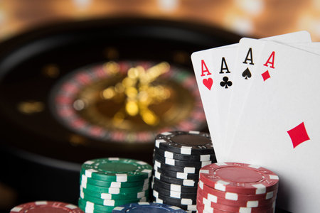 Poker Chips on gaming table, roulette