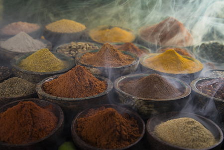 Aromatic spices, smoke and Still Life backgroundの写真素材