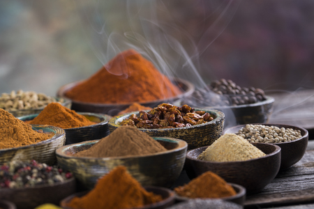 Smoke, Aromatic spices on wooden backgroundの写真素材