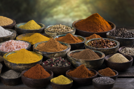 Cookbook and various spices backgroundの写真素材