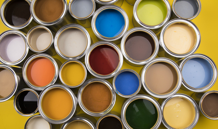 Paint cans color palette, yellow backgroundの写真素材
