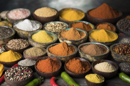 Cookbook and various spices backgroundの写真素材