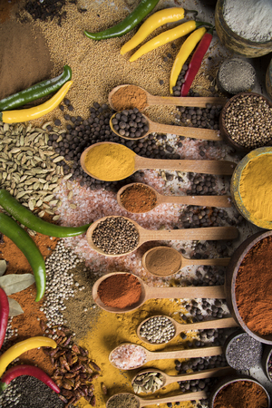 Cookbook and various spices backgroundの写真素材