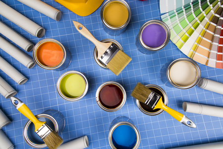 Colorful paint can,brush, blue backgroundの写真素材