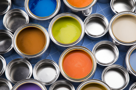 Full Buckets of rainbow colored oil paintの写真素材