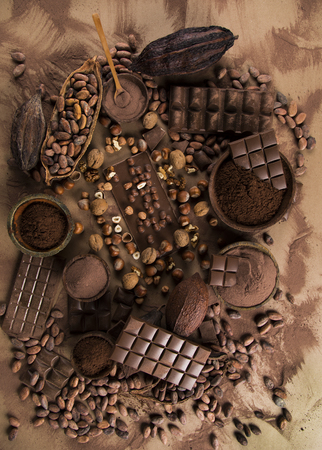 Aromatic cocoa and chocolate on natural paper backgroundの写真素材
