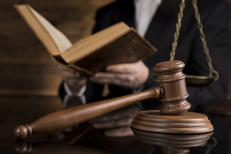 Courtroom, Judge, male judge in black mirror backgroundの写真素材