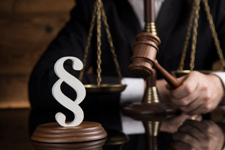 Paragraph, Judge hold hammer on wooden table