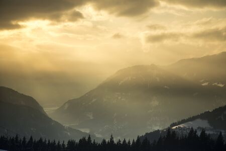 Mountains, winter landscape, Sunset backgroundの写真素材