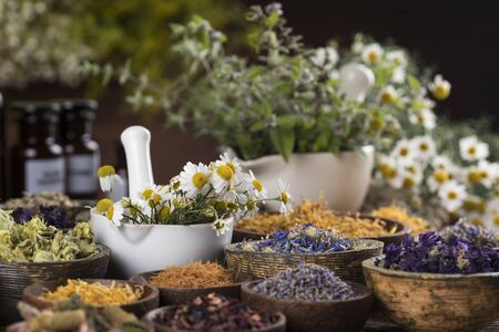 Natural remedy,Herbal medicine and wooden table backgroundの写真素材