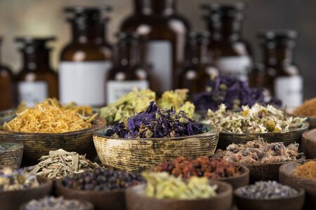 Natural remedy,Herbal medicine and wooden table backgroundの写真素材