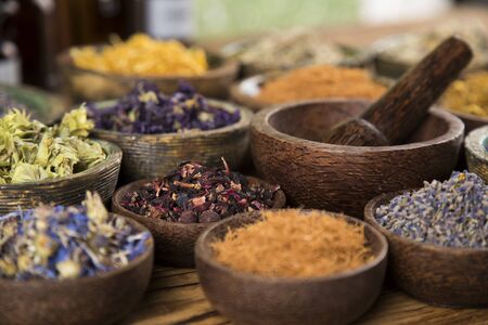 Natural remedy and wooden table backgroundの写真素材