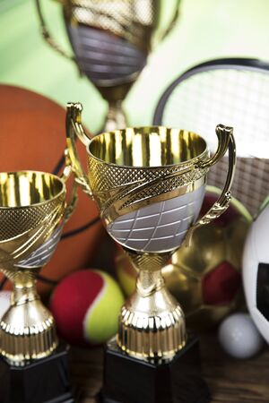 Trophy cup and sport ball backgroundの写真素材