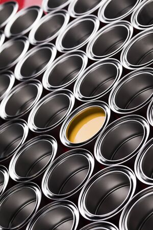 reativity concept group of tin metal cans with color paintの写真素材