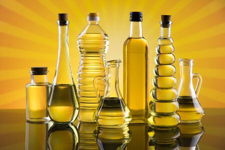 Healthy oil from sunflower, olive, rapeseed oil. Cooking oils in bottleの写真素材