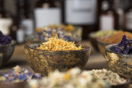 Natural remedy,Herbal medicine and wooden table backgroundの写真素材