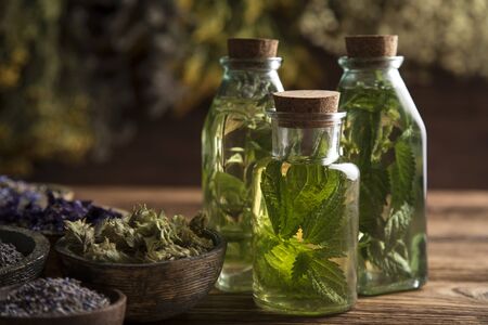 Oil and Natural medicine, wooden table backgroundの写真素材