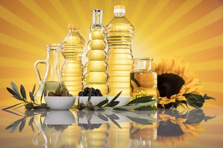 Healthy oil from sunflower, olive, rapeseed oil. Cooking oils in bottleの写真素材