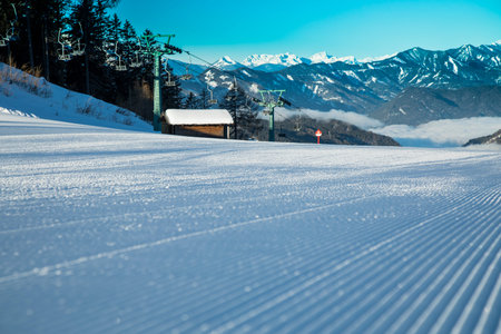 Winter mountains panorama with ski slope